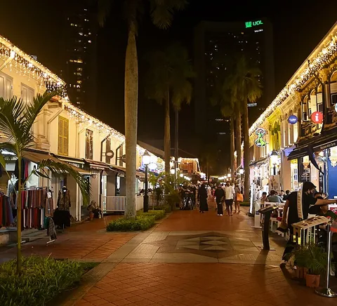 Bussorah pedestrian street in Kampong Gelam at night, photographed April 2022.